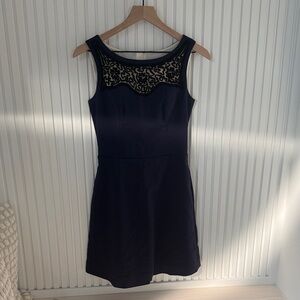 Elegant Black Sleeveless Dress with Lace Detail